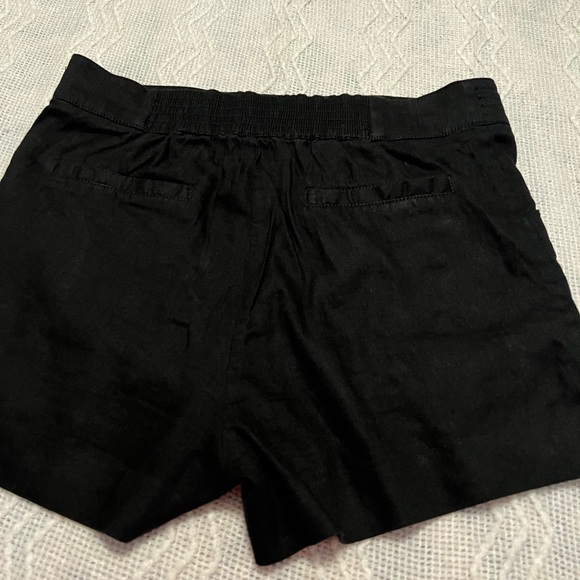 #1056. Bebe Black Flair Cargo Shorts with Button and Pocket Details. Size M - Picture 7 of 8